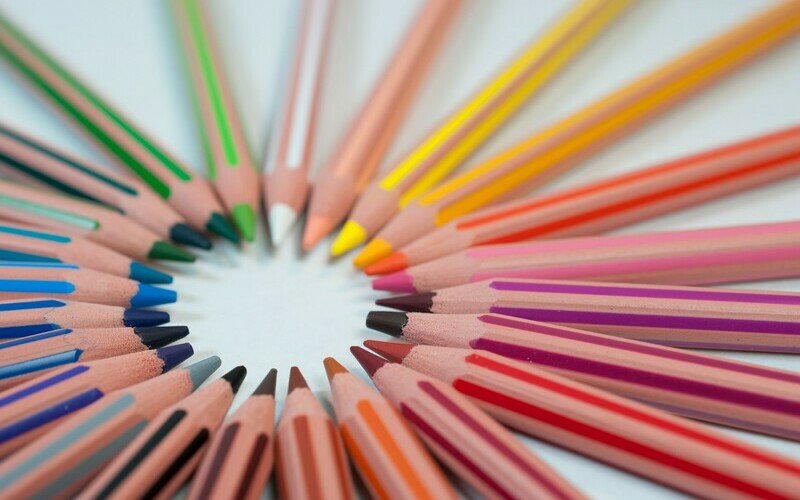 coloured pencils making a circle